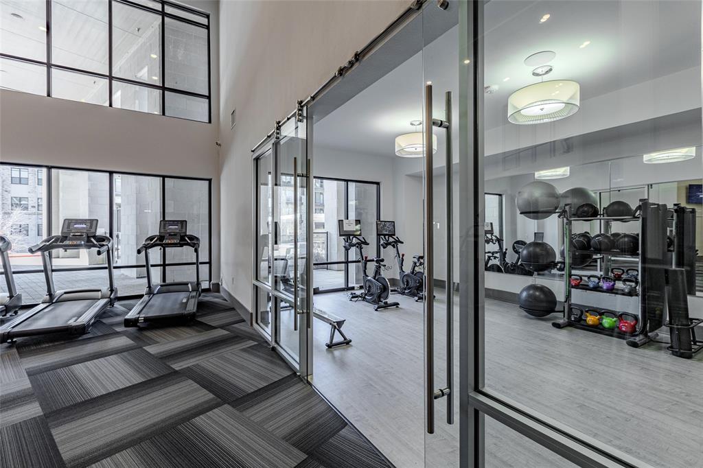 2700 Old Denton Road, Unit 4473 Carrollton, TX 75007 - Photo 20 of 27 a view of a room with gym equipment