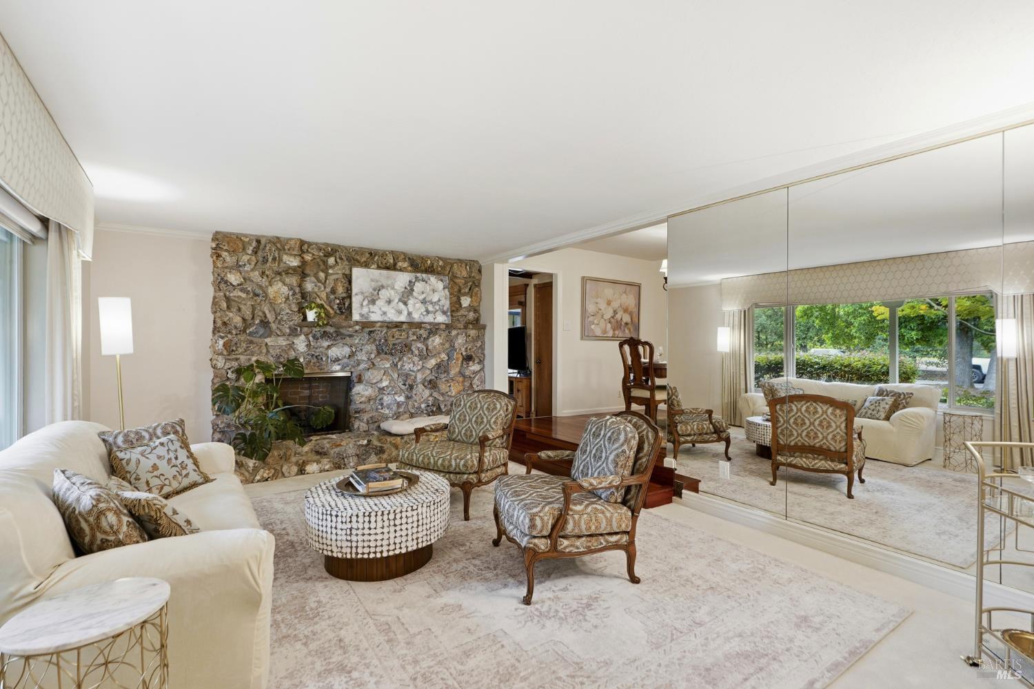 373 Piezzi Road Santa Rosa, CA 95401 - Photo 7 of 55 a living room with furniture and a floor to ceiling window