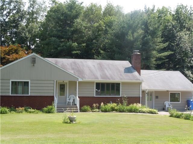 497 Purdy Hill Road Monroe, CT 06468 - Photo 1 of 1 a front view of a house with a yard