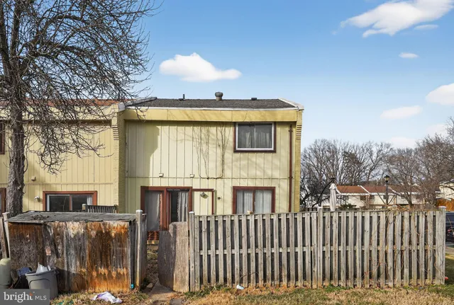 a view of a house with a iron gate