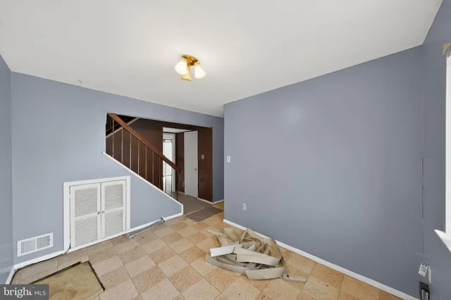 a view of a livingroom with wooden floor