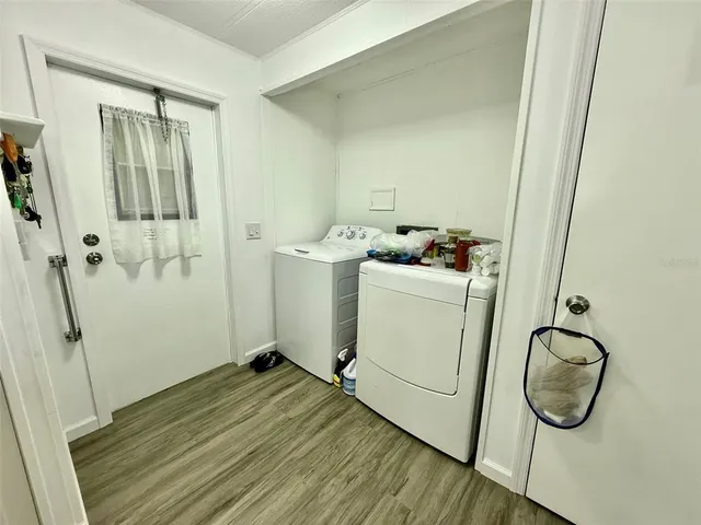 a bathroom with a sink and mirror with toilet