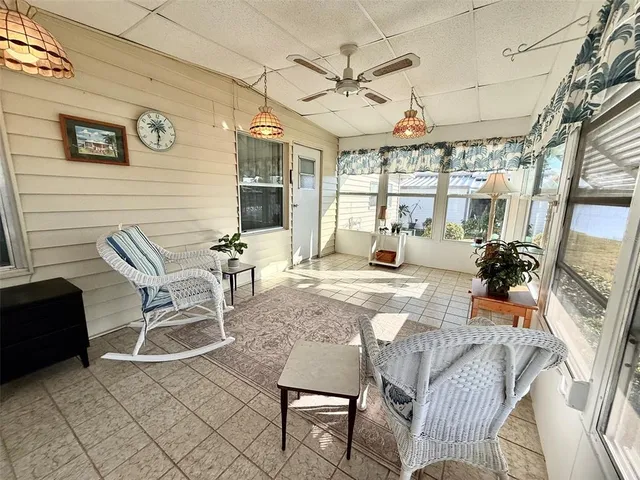 a view of swimming pool with outdoor seating