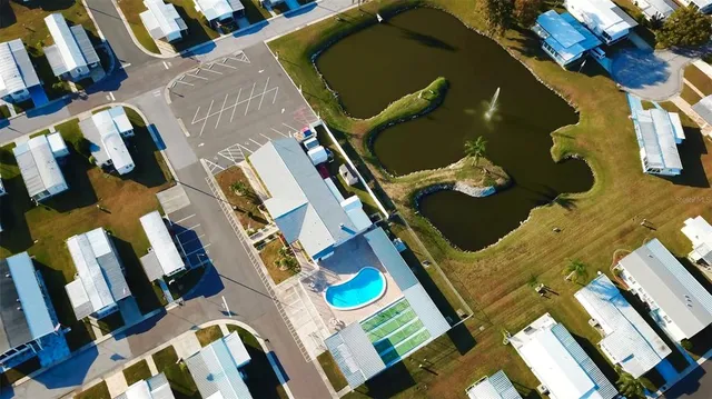 a kitchen with stainless steel appliances granite countertop a sink stove and a refrigerator