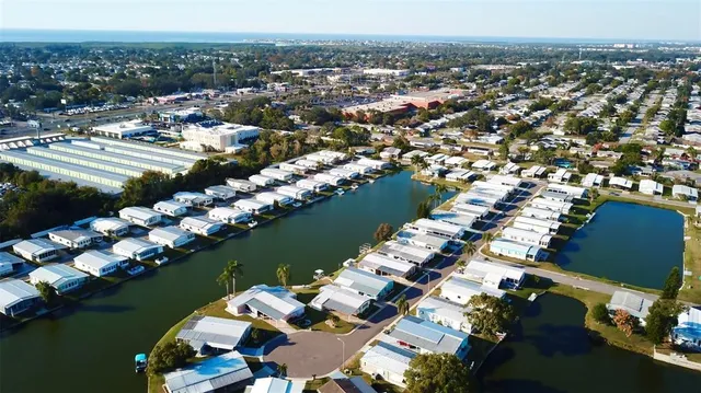 a view of a street with car parked