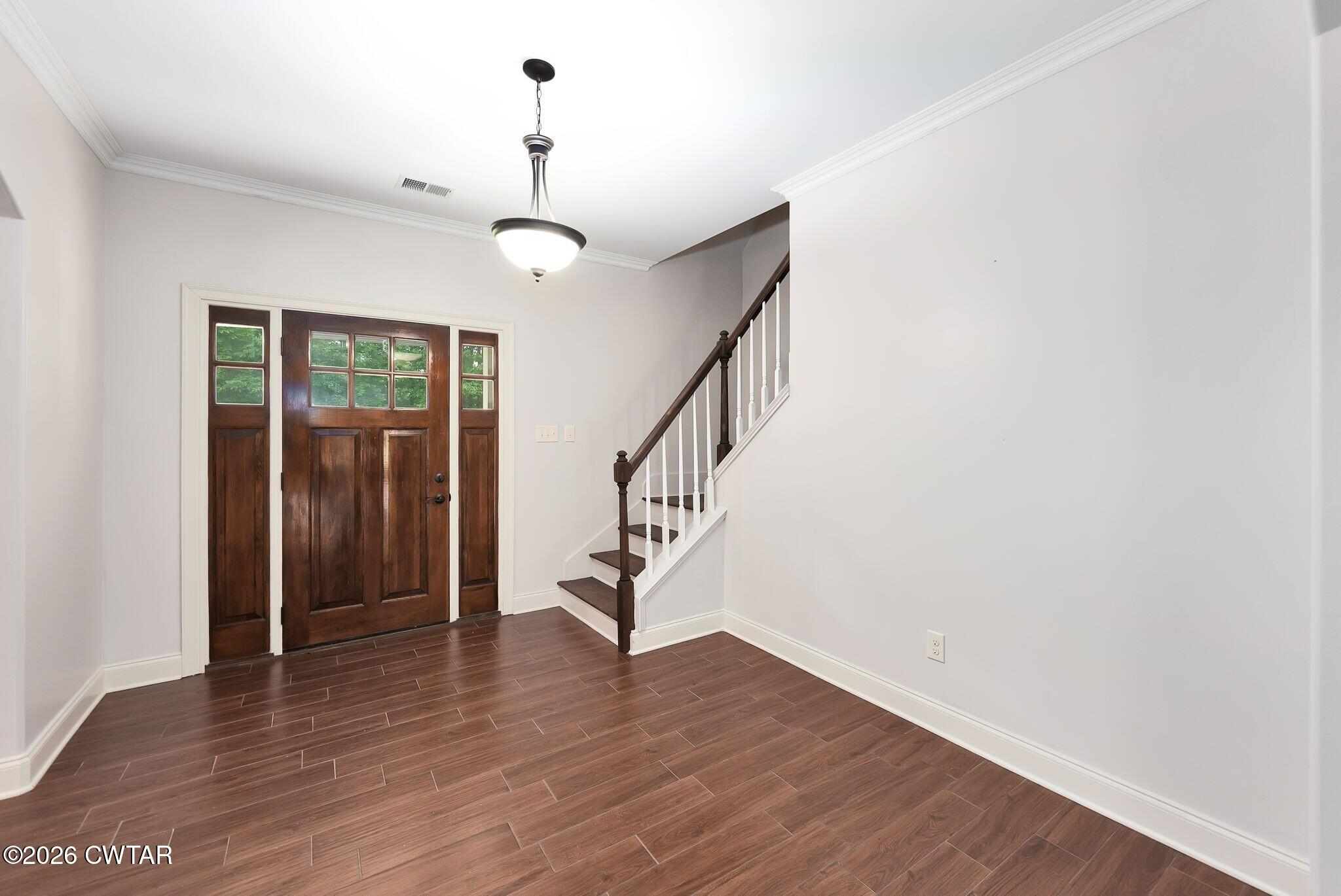 4080 Beech Bluff Road Beech Bluff, TN 38313 - Photo 13 of 41 a view of entryway with wooden floor