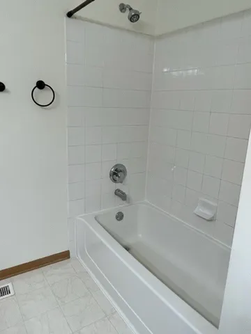 a bathroom with a bathtub