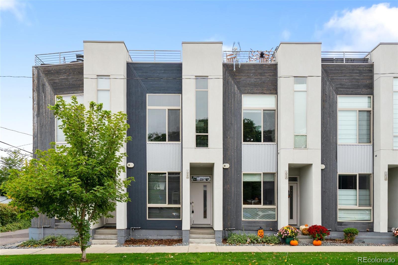 a front view of building with yard