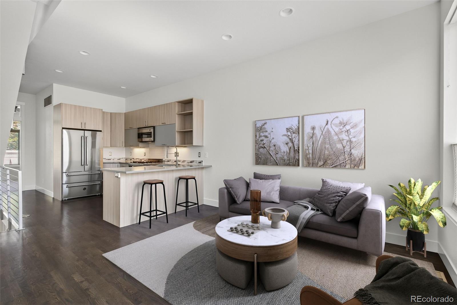 1022 West 37th Avenue Denver, CO 80211 - Photo 2 of 29 a living room with stainless steel appliances furniture a dining table and chairs