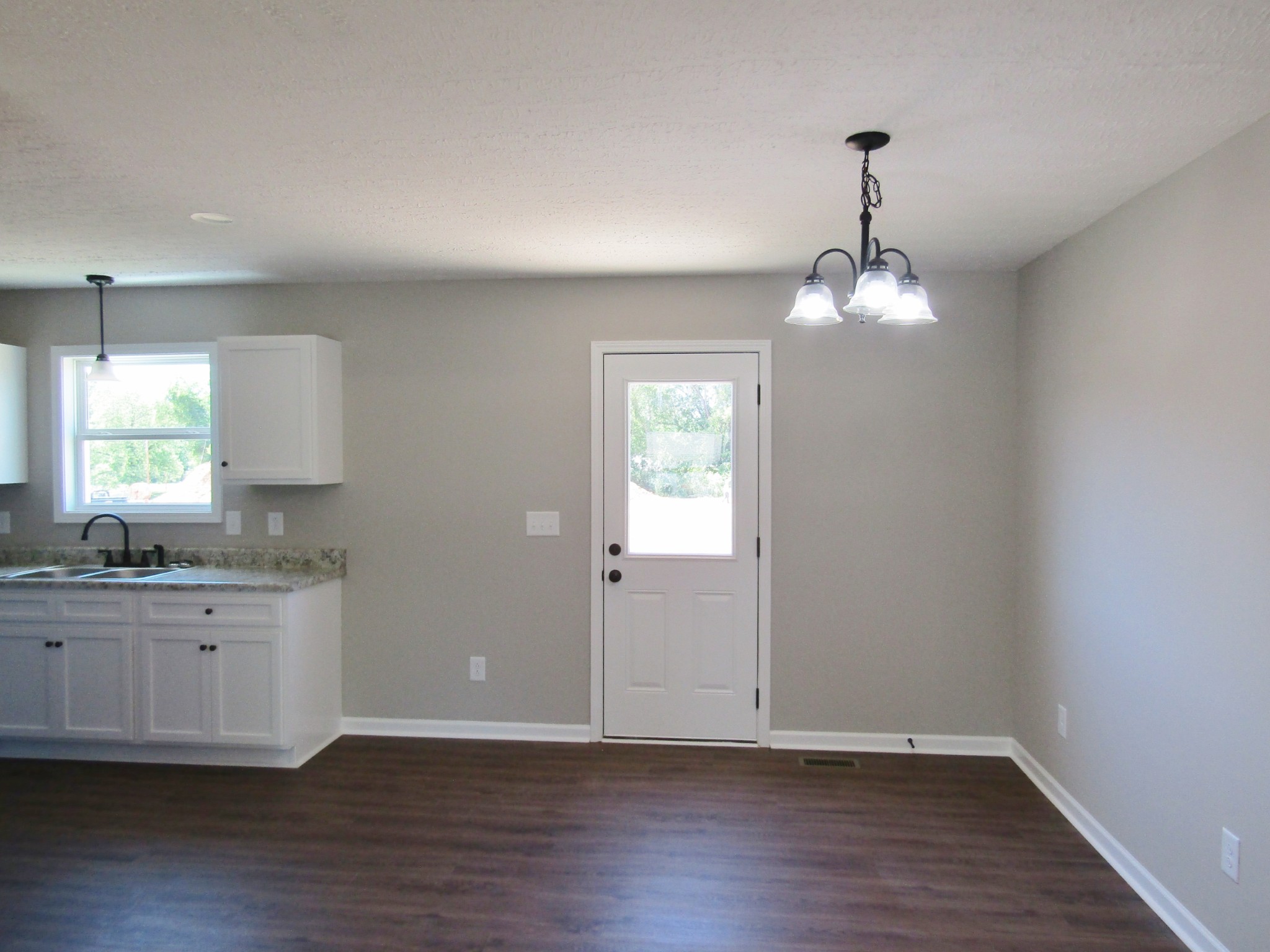 470 Crescent Factory Road Lawrenceburg, TN 38464 - Photo 5 of 15 a view of cabinets and wooden floor