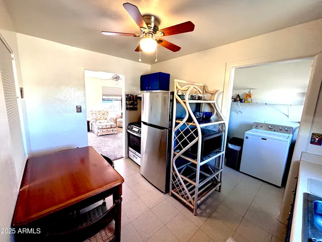 a room with furniture and air hockey table