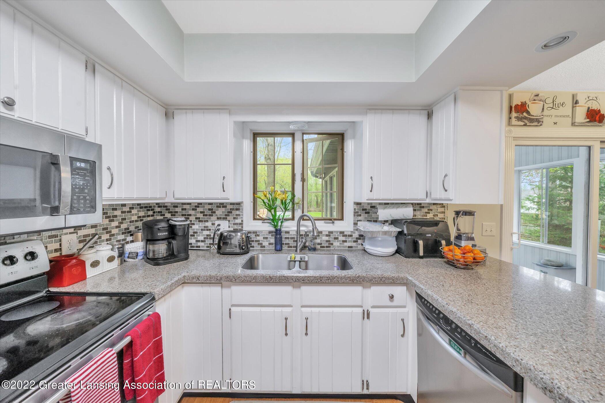 839 Spring Mill Drive Haslett, MI 48840 - Photo 10 of 48 17-839-Spring-Mill-Dr-WindowStill-Real-E