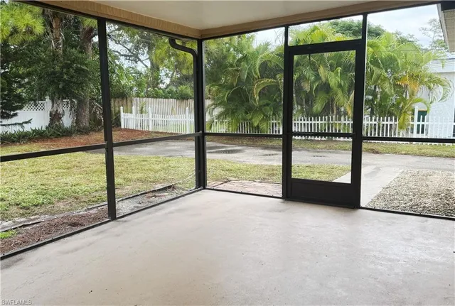 a view of a backyard of the house