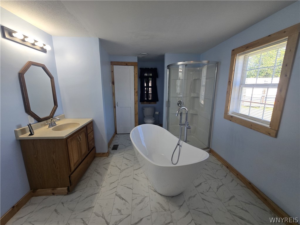 12507 Ridge Road Ridgeway, NY 14103 - Photo 8 of 22 primary bedroom 1 bathroom