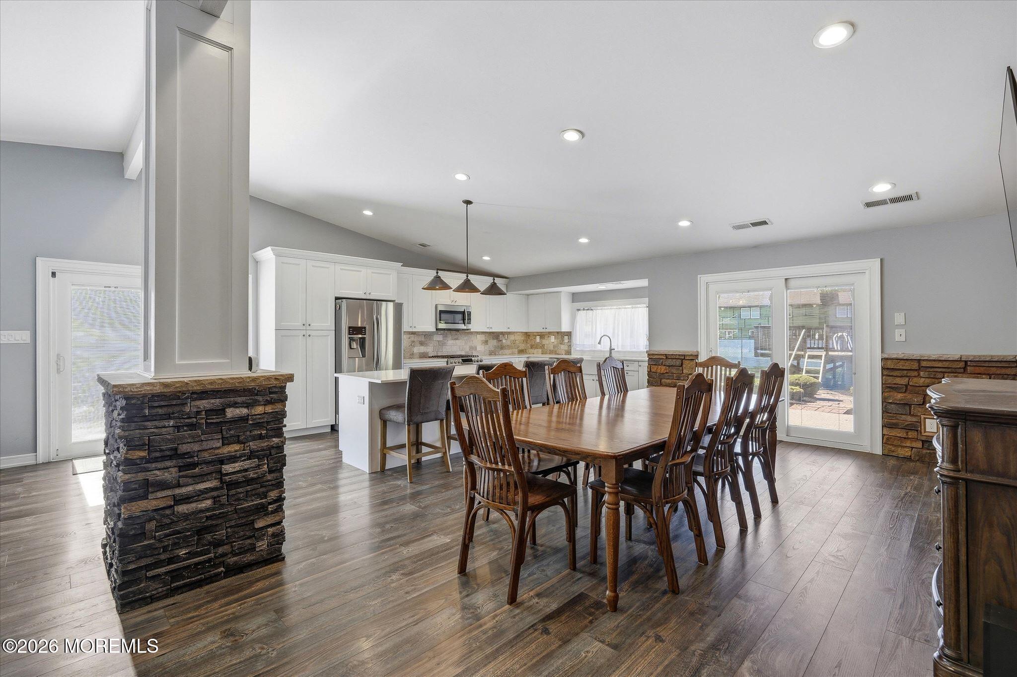 22 Ethan Allen Road Freehold, NJ 07728 - Photo 9 of 31 a view of a a dining room with furniture window and wooden floor