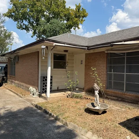 a front view of a house with patio