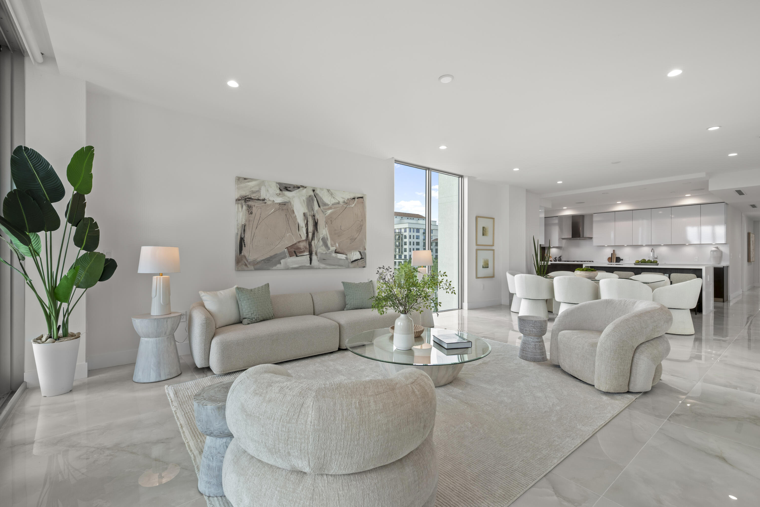 475 East Royal Palm Road, Unit 506 Boca Raton, FL 33432 - Photo 16 of 67 a living room with furniture white walls and a potted plant