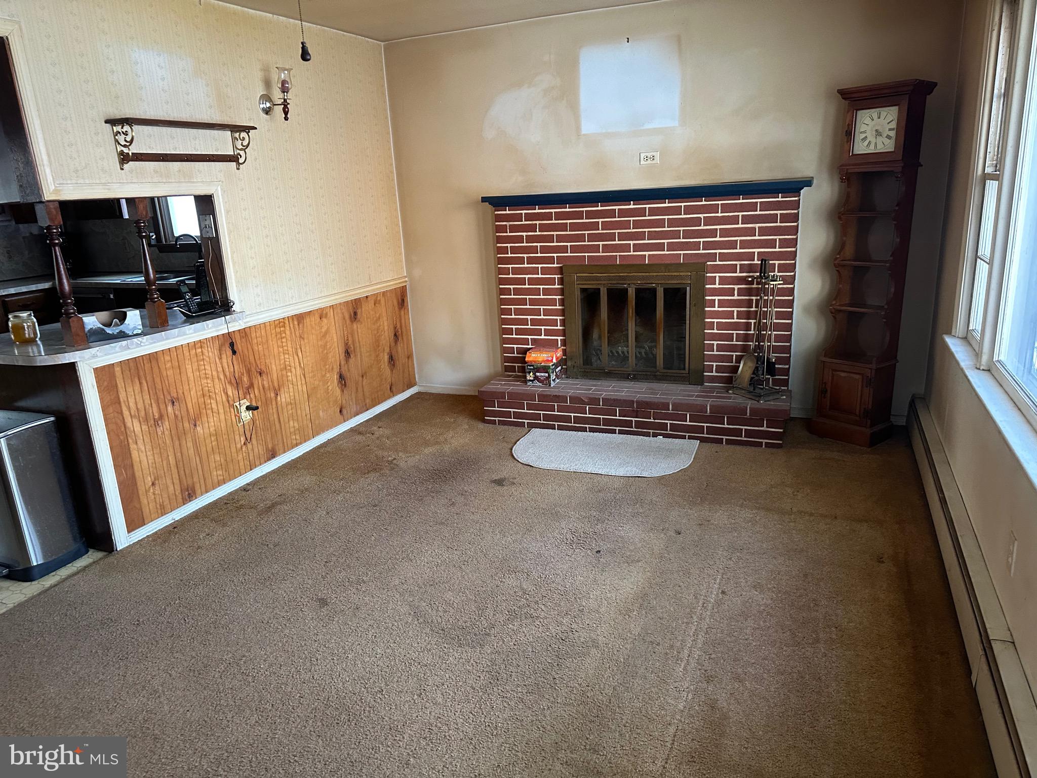 412 Grandview Avenue Perkasie, PA 18944 - Photo 11 of 11 a living room with furniture a fireplace and a flat screen tv
