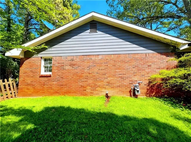a backyard of a house with lots of green space