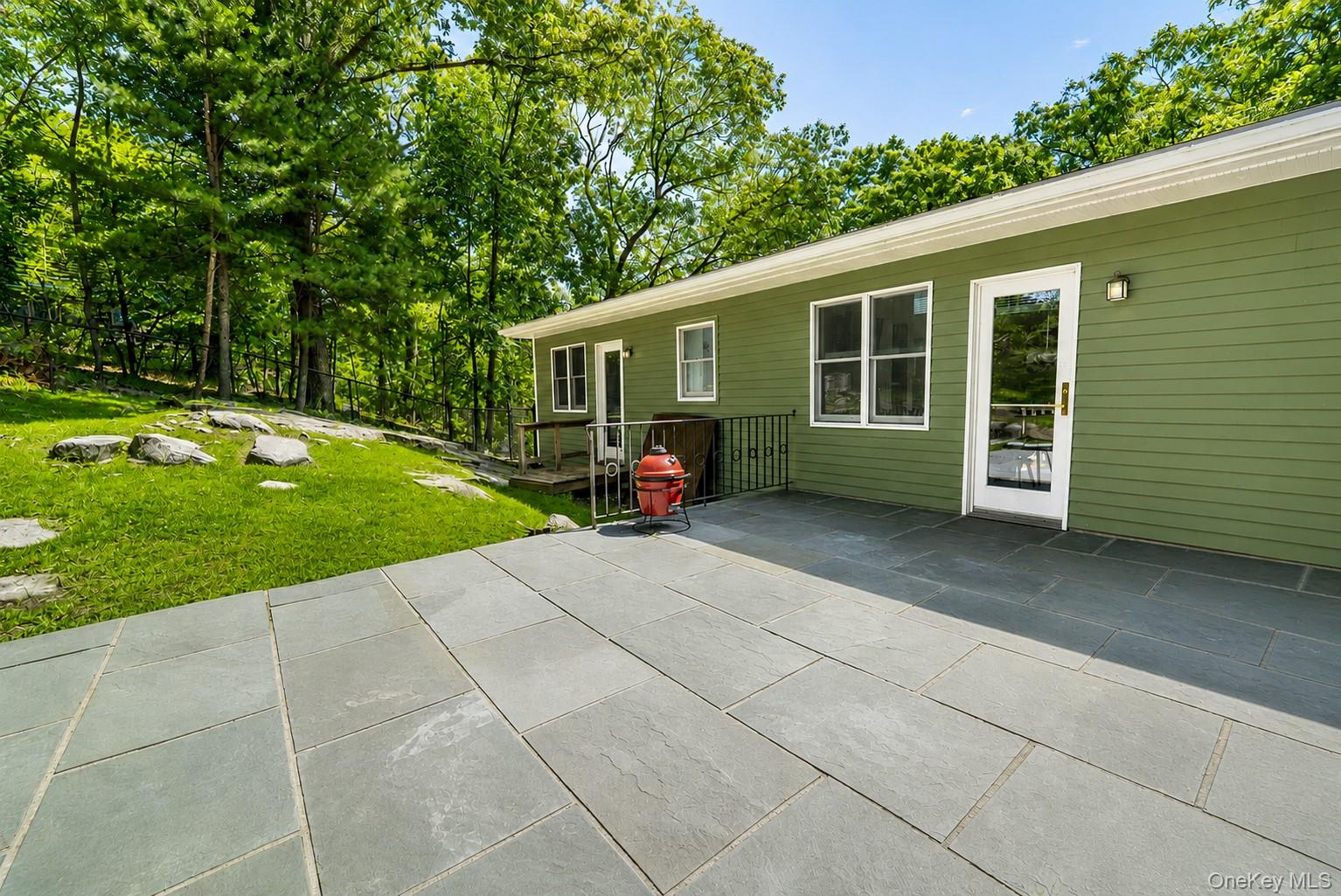 31 Pleasant Road Lake Peekskill, NY 10537 - Photo 32 of 41 Backyard patio with easy access to dining room and kitchen.
