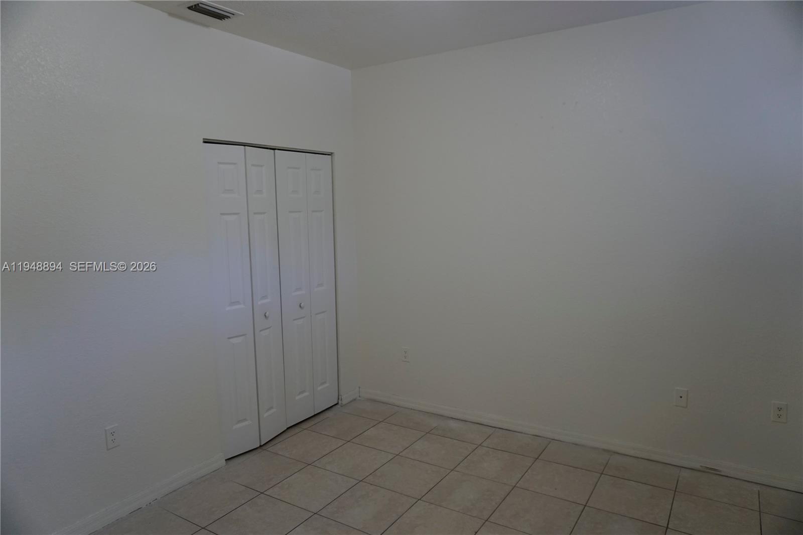 18213 Southwest 109th Path Miami, FL 33157 - Photo 12 of 26 a view of an empty room