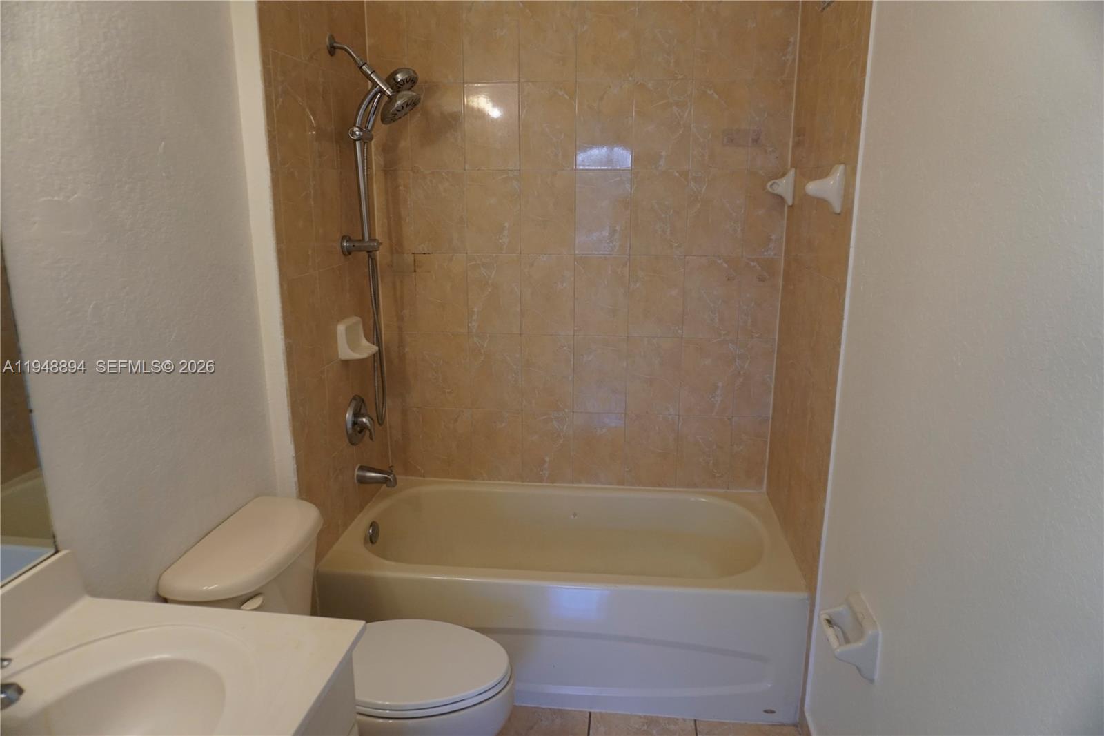 18213 Southwest 109th Path Miami, FL 33157 - Photo 18 of 26 a bathroom with a bathtub toilet and sink