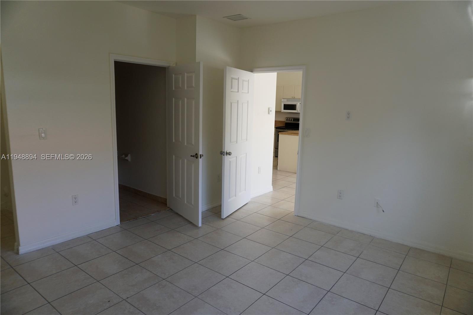 18213 Southwest 109th Path Miami, FL 33157 - Photo 20 of 26 an empty room with cabinet