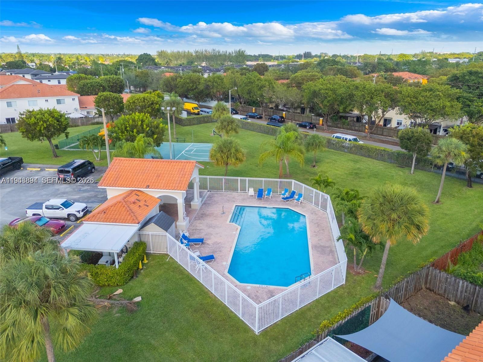 18213 Southwest 109th Path Miami, FL 33157 - Photo 25 of 26 an aerial view of a house with yard swimming pool and outdoor seating