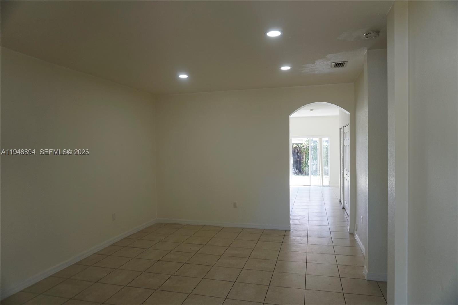 18213 Southwest 109th Path Miami, FL 33157 - Photo 10 of 26 a view of an empty room with a mirror