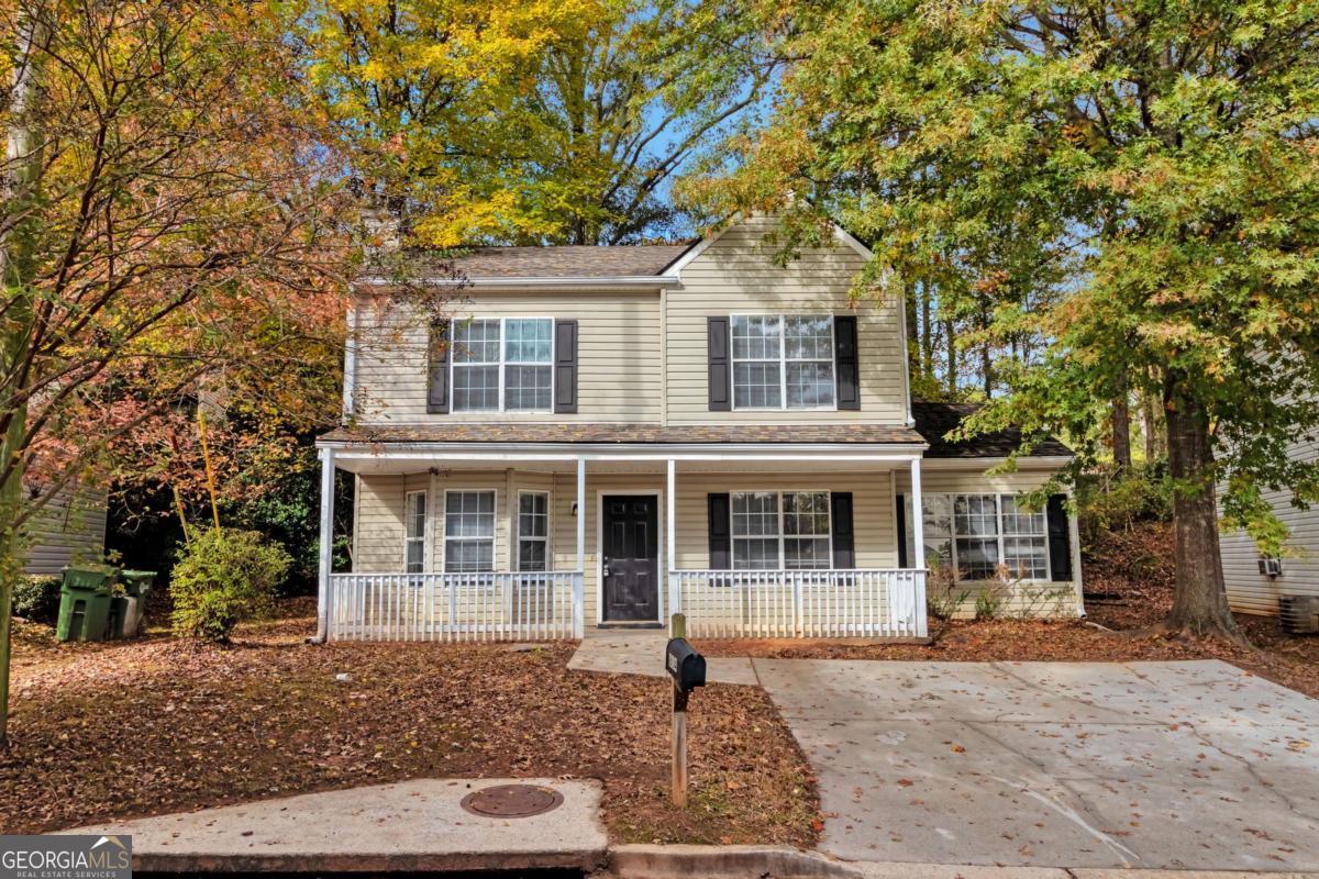 front view of a house with a yard