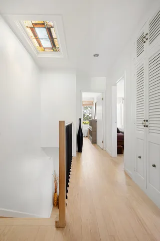 a view of a livingroom with wooden floor