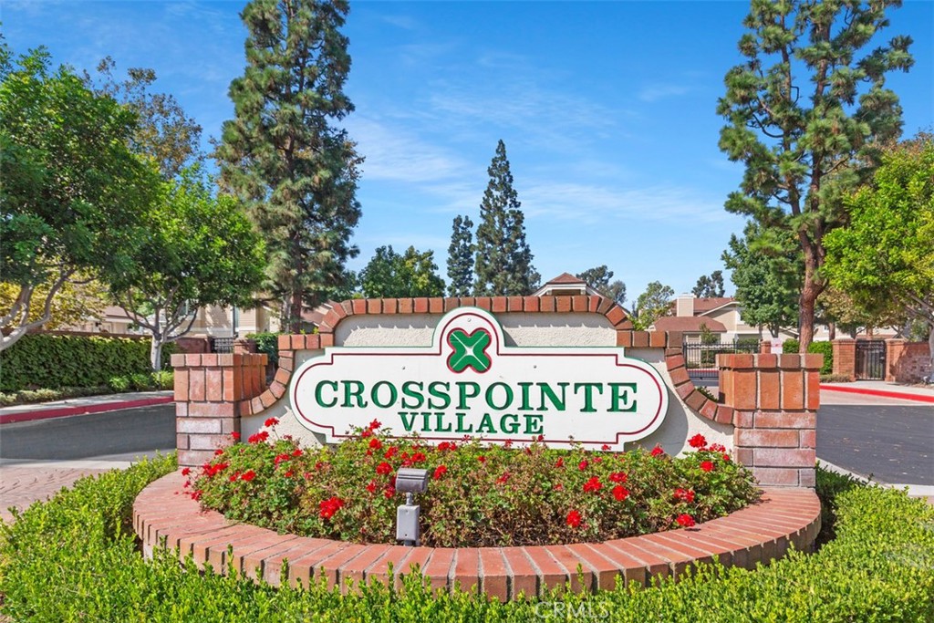 12700 Fallbrook Way Stanton, CA 92841 - Photo 26 of 31 a view of a sign board with lots of trees in the background