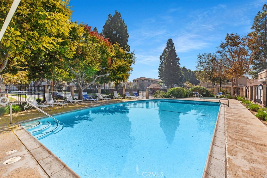 12700 Fallbrook Way Stanton, CA 92841 - Photo 27 of 31 a view of a swimming pool with a lake view