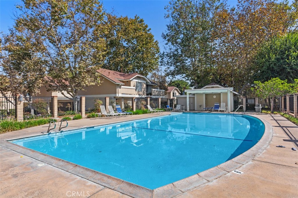 12700 Fallbrook Way Stanton, CA 92841 - Photo 29 of 31 a view of a house with pool and trees
