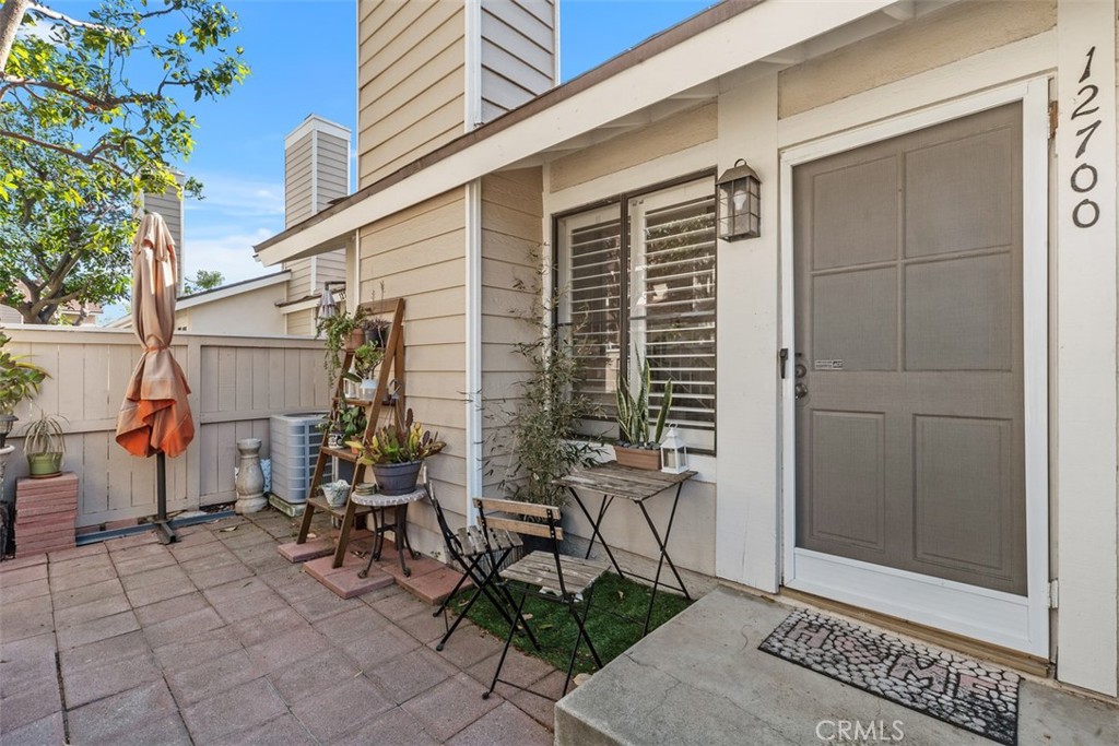 12700 Fallbrook Way Stanton, CA 92841 - Photo 3 of 31 a view of a dinning tables and chair in the house front of a house