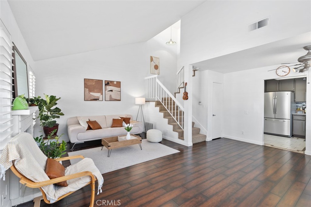 12700 Fallbrook Way Stanton, CA 92841 - Photo 4 of 31 a living room with furniture and wooden floor