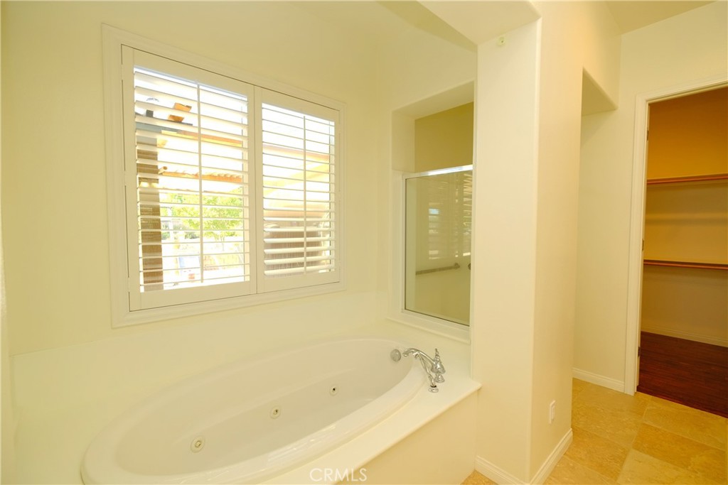 1791 Hannon Road Cherry Valley, CA 92223 - Photo 21 of 41 a white bath tub sitting next to a window