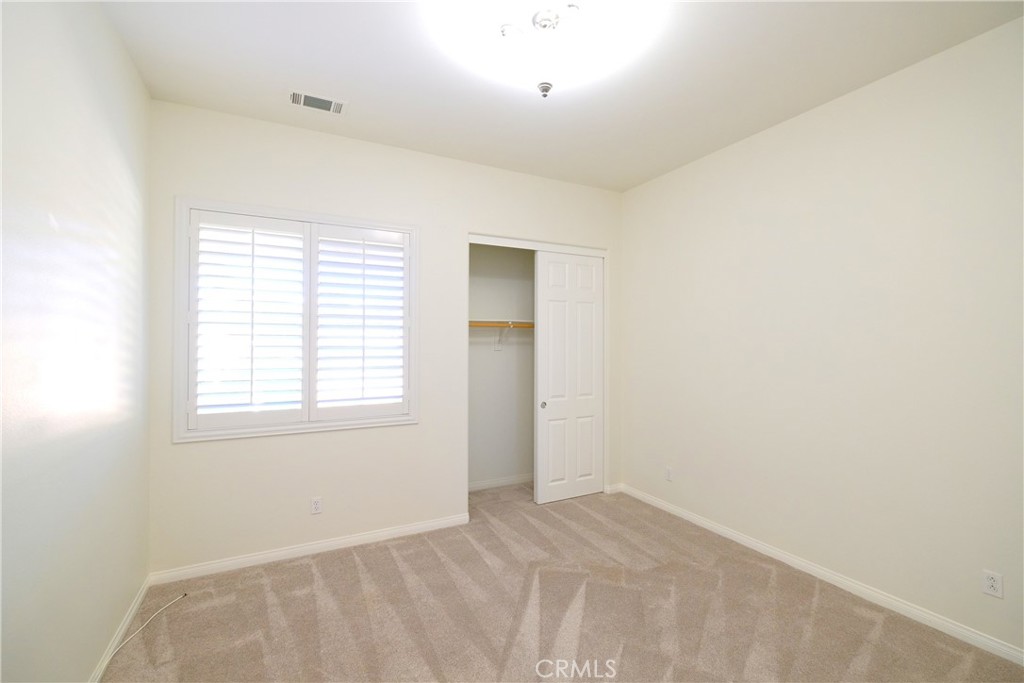 1791 Hannon Road Cherry Valley, CA 92223 - Photo 24 of 41 an empty room with a window