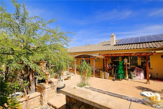 a view of a backyard of the house