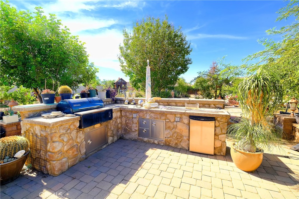 1791 Hannon Road Cherry Valley, CA 92223 - Photo 31 of 41 a view of a patio with swimming pool
