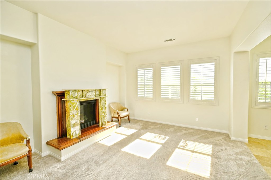 1791 Hannon Road Cherry Valley, CA 92223 - Photo 7 of 41 a view of a livingroom with a fireplace and window