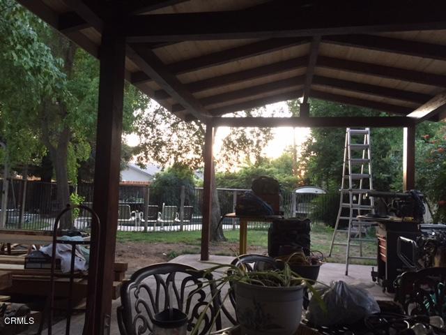 339 South Reed Avenue Reedley, CA 93654 - Photo 13 of 16 a view of a porch and chairs in patio