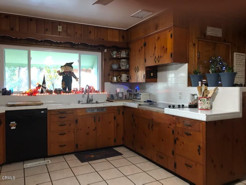 339 South Reed Avenue Reedley, CA 93654 - Photo 3 of 16 a kitchen with sink cabinets and window