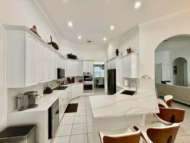 a bedroom with a bed and lamp