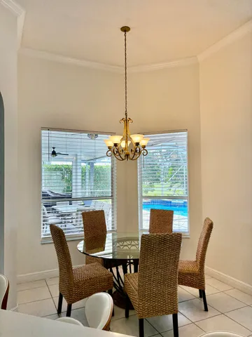 a bathroom with a sink a granite counter and shower