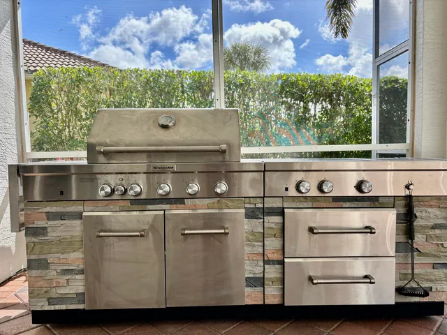 a view of swimming pool with outdoor seating