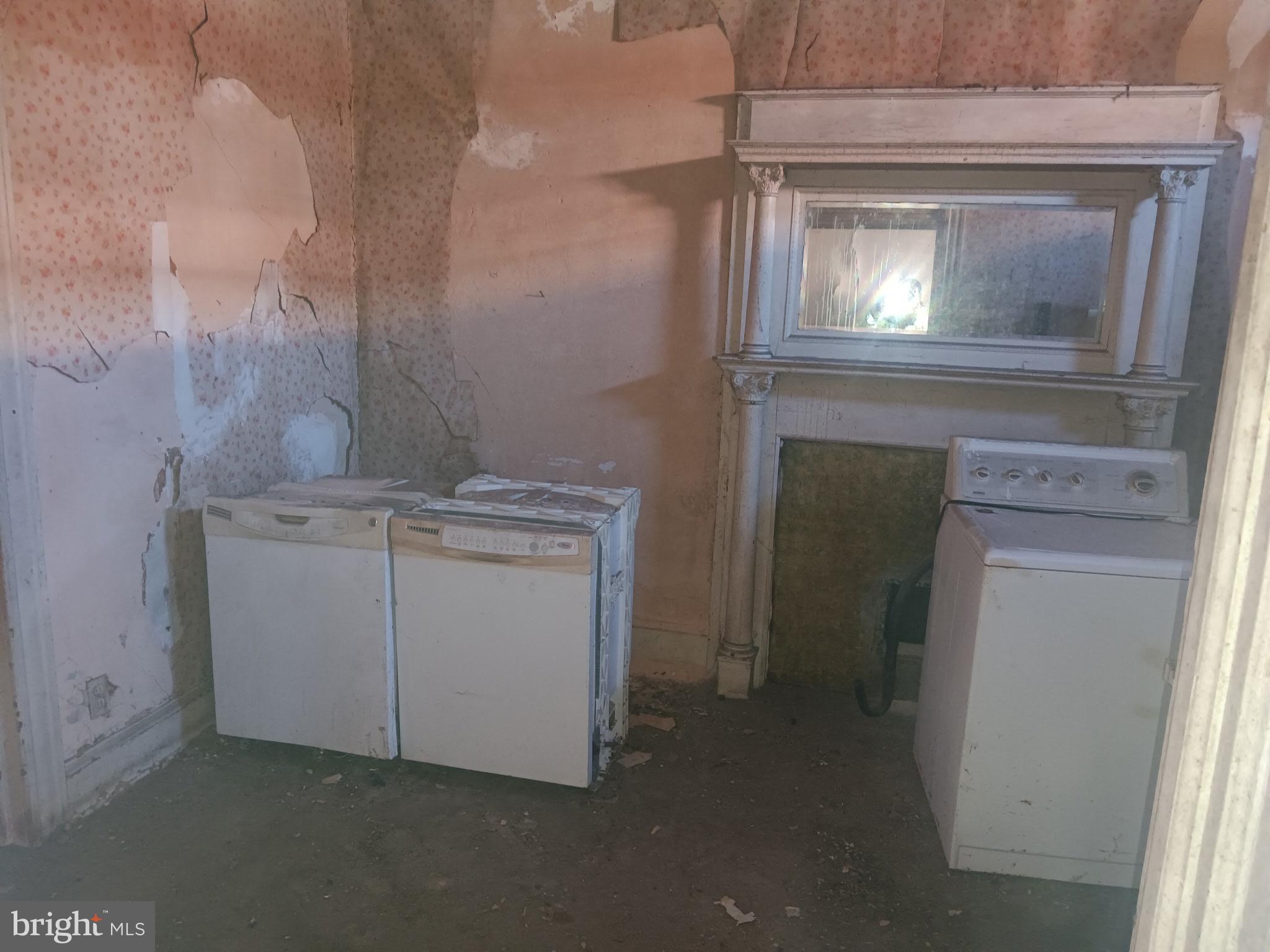 2605 East Preston Street Baltimore, MD 21213 - Photo 4 of 9 a utility room with a sink dryer and washer
