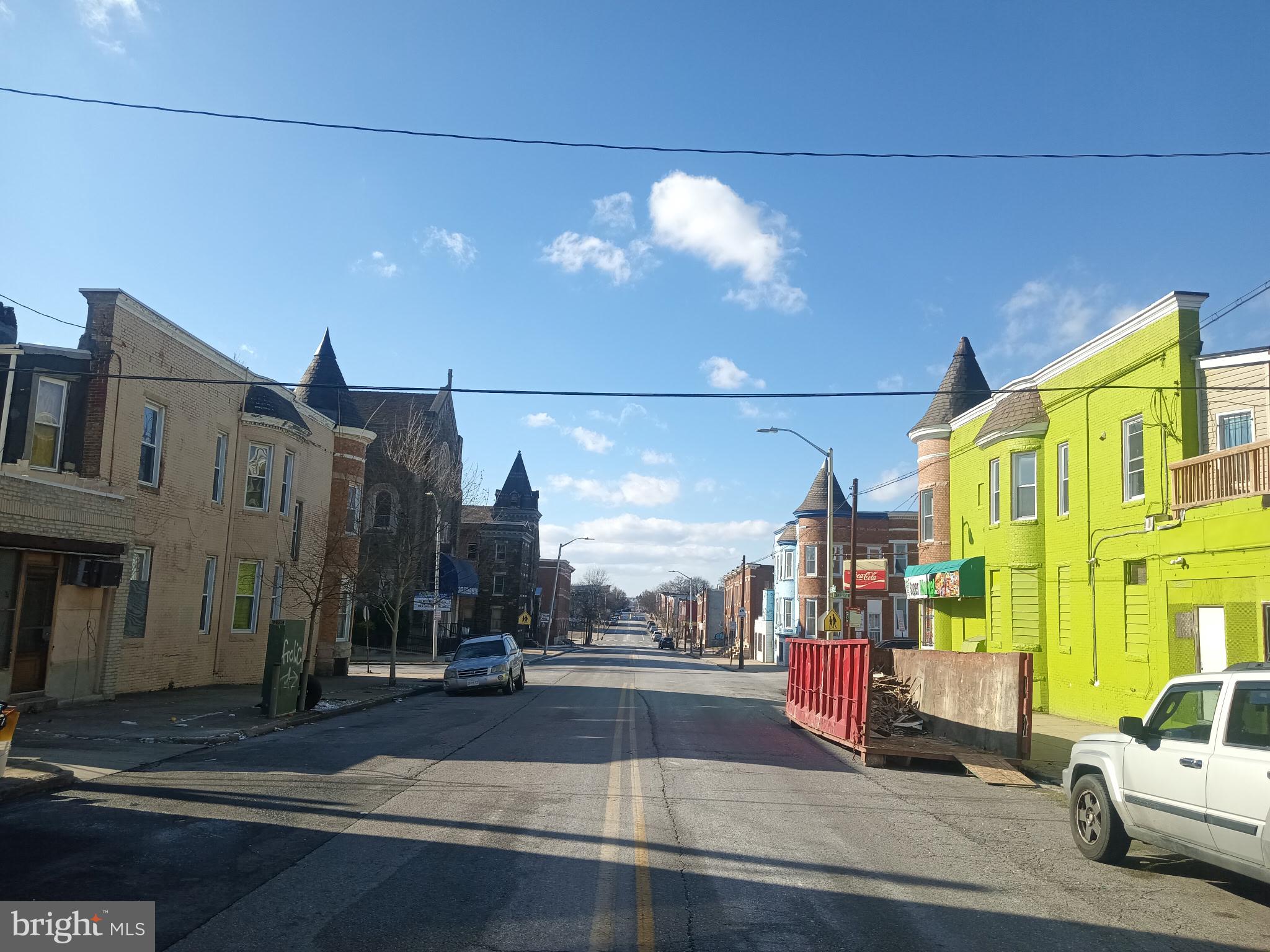 2605 East Preston Street Baltimore, MD 21213 - Photo 9 of 9 a view of a street with cars