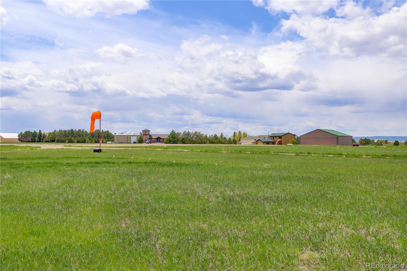 24943 Ben Kelly Road Elbert, CO 80106 - Photo 33 of 39 a view of a green field with clear sky