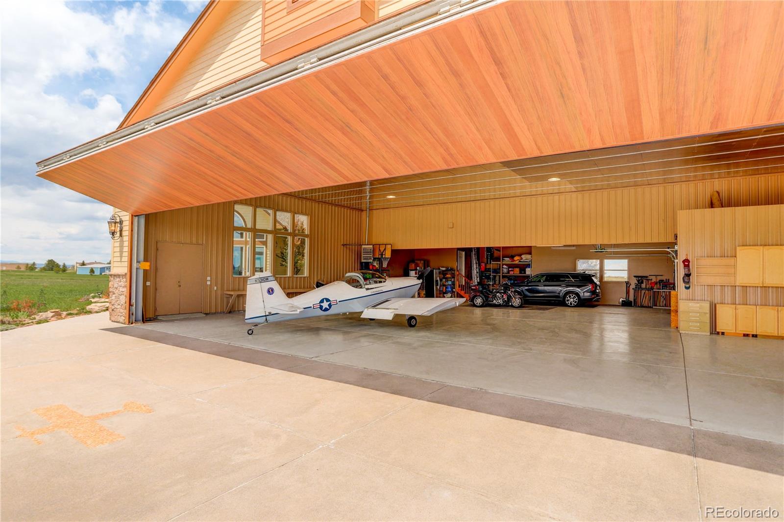 24943 Ben Kelly Road Elbert, CO 80106 - Photo 8 of 39 a view of a building with a patio